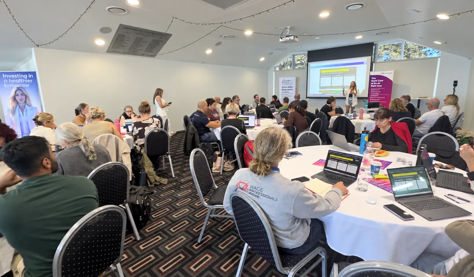 A full room of business owners building AI systems during the previous Lock-In